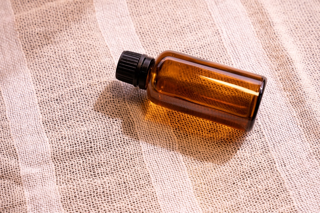 Mock-up amber glass bottles on a natural background