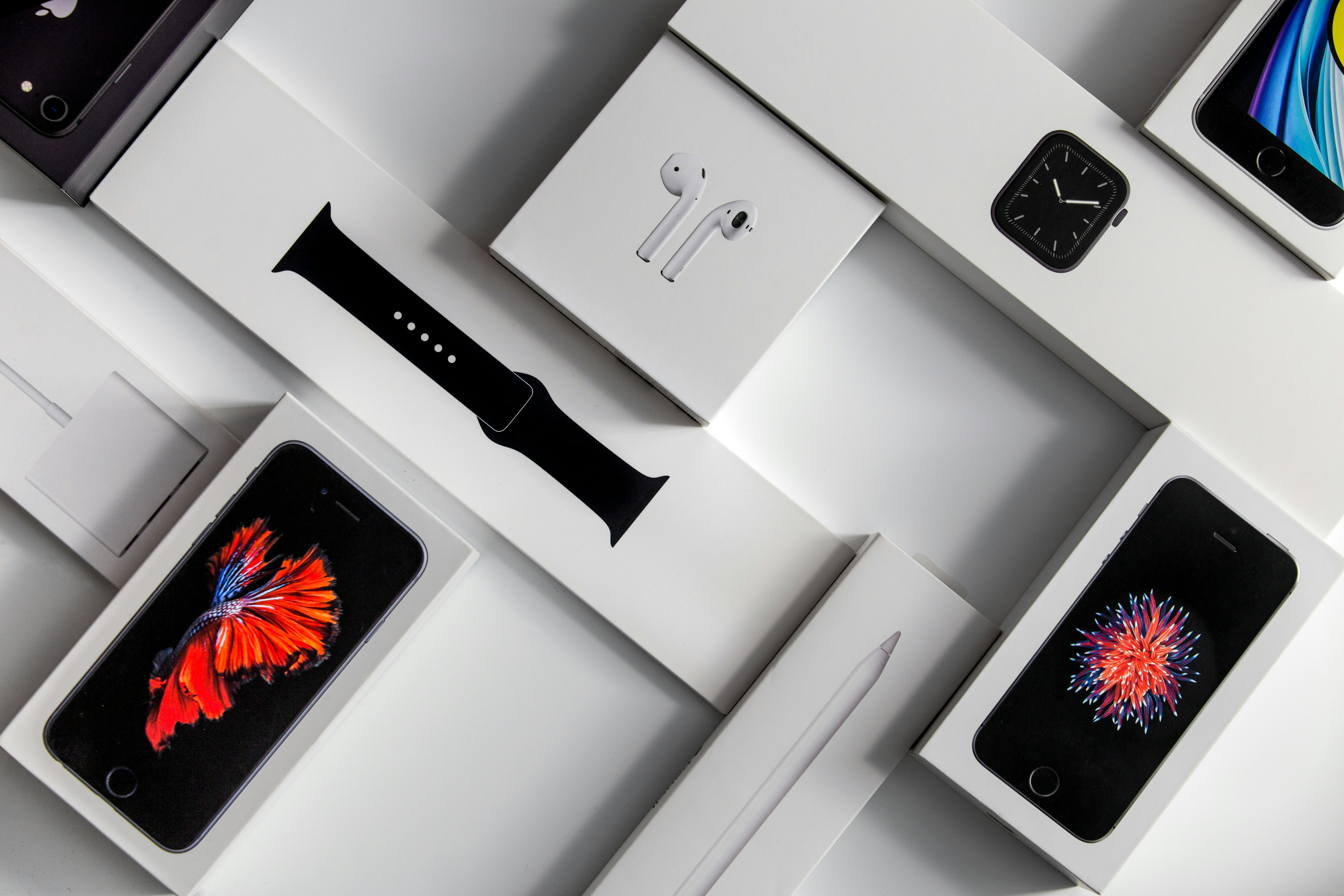 Unboxed Apple products laid out on a table
